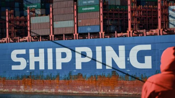 cargo ship carrying goods that says “shipping